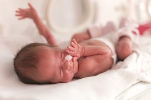 Premature newborn baby girl in the hospital